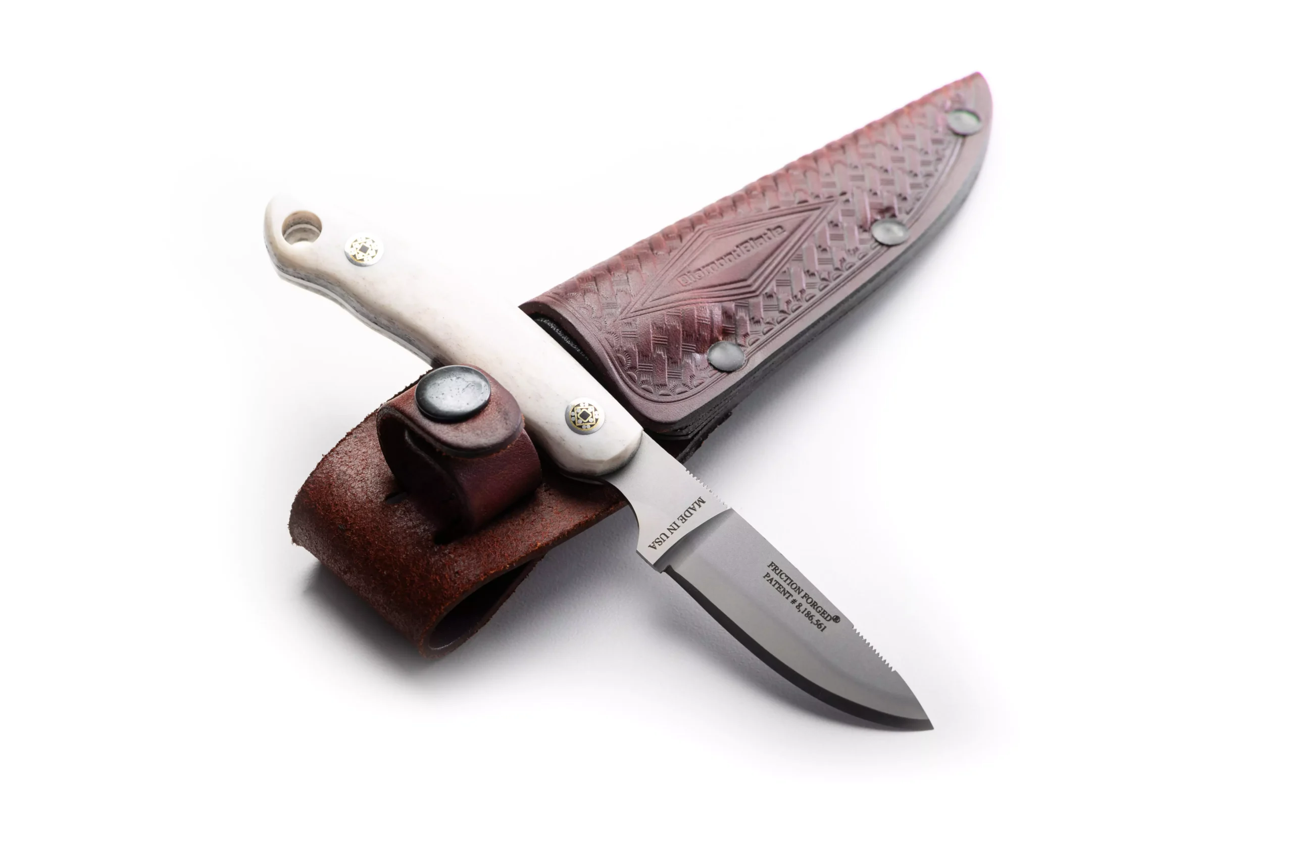 Alpha I knife with stag handle partially unsheathed from leather case by DiamondBlade Knives, showcasing Friction Forged Technology