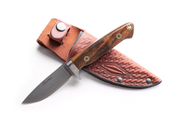 Heritage knife with premium ironwood handle displayed over tooled leather DiamondBlade sheath