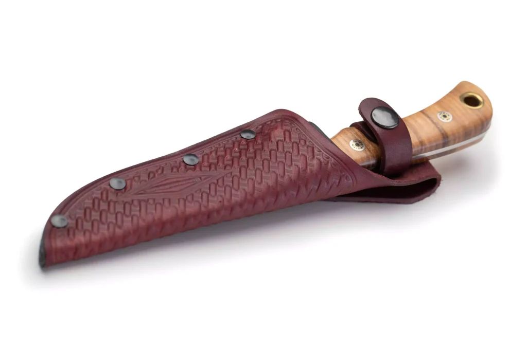 DiamondBlade Surge knife with ash wood handle secured in basketweave leather sheath