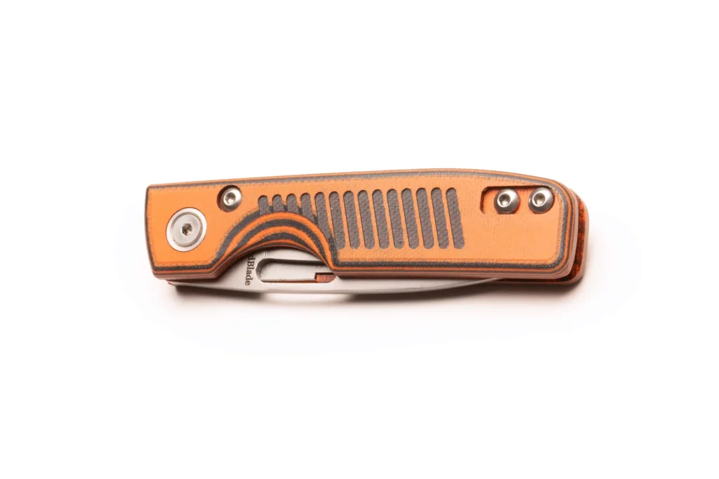 Closed Fury folding knife with orange and black G10 handle and stainless steel pocket clip by DiamondBlade Knives